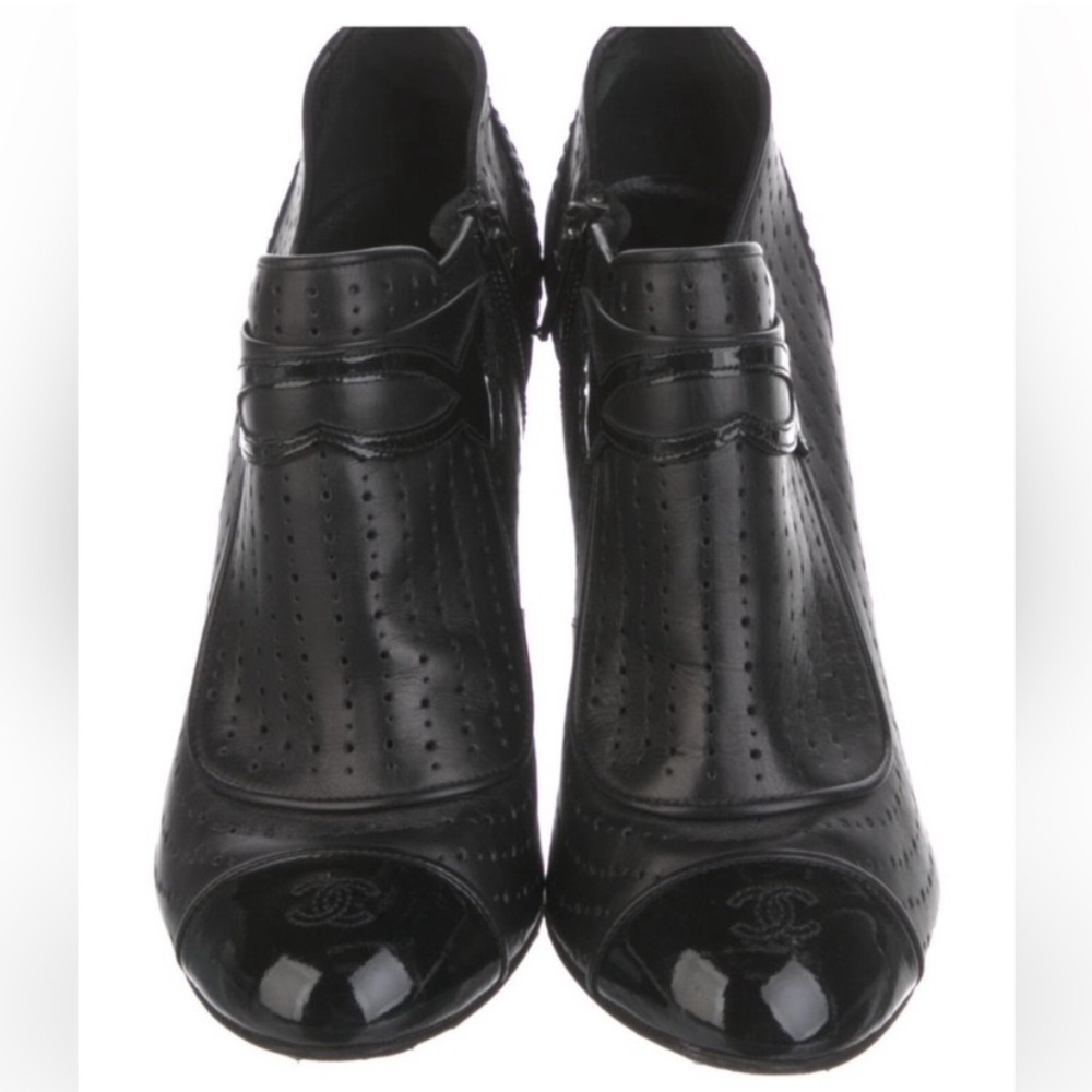 Chanel Authentic actual pic stellar black
booties logo each toe. Size 38. Size 8
